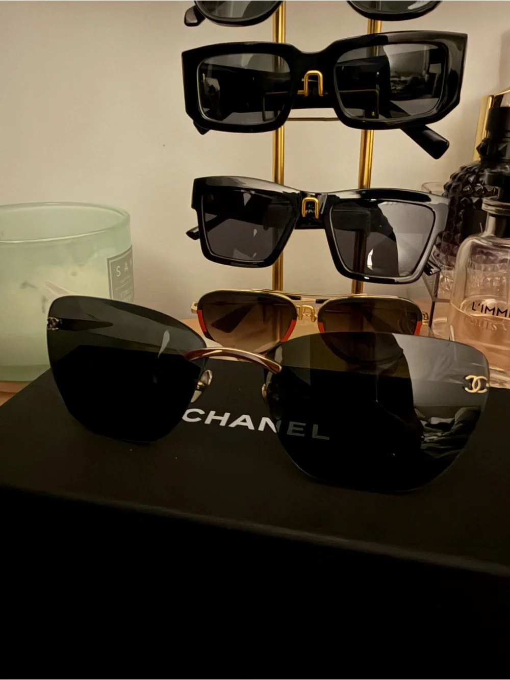 CHANEL Black Frame Sunglasses with Dark Lenses